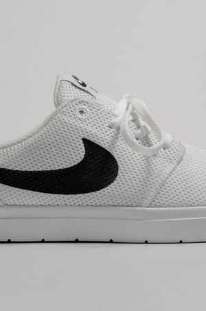 Close-up image of a Nike mesh shoe.